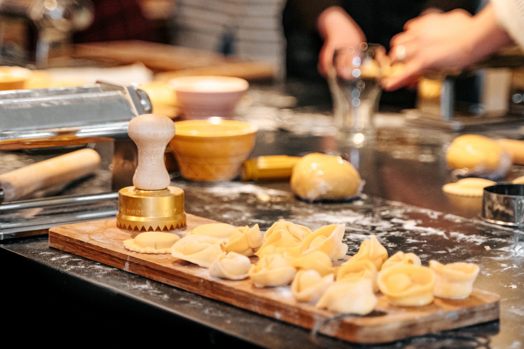 Handmade tortellini and ravioli on a board