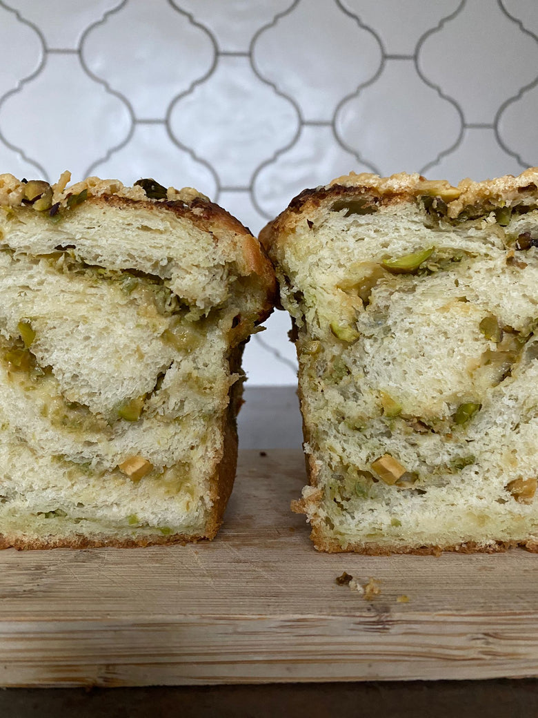 SAVORY BRAIDED BRIOCHE WITH GREEN OLIVES SPREAD, PISTACHIOS AND PECORINO CHEESE