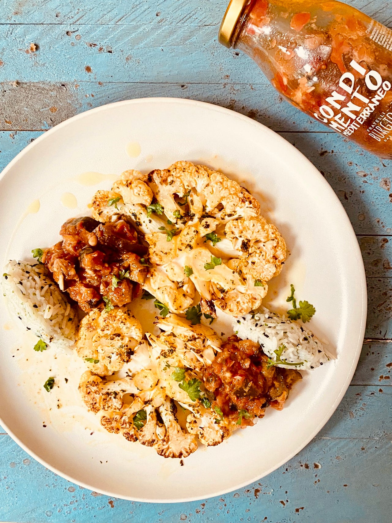 CAULIFLOWER STEAK WITH CONDIMENTO MEDITERRANEO SAUCE