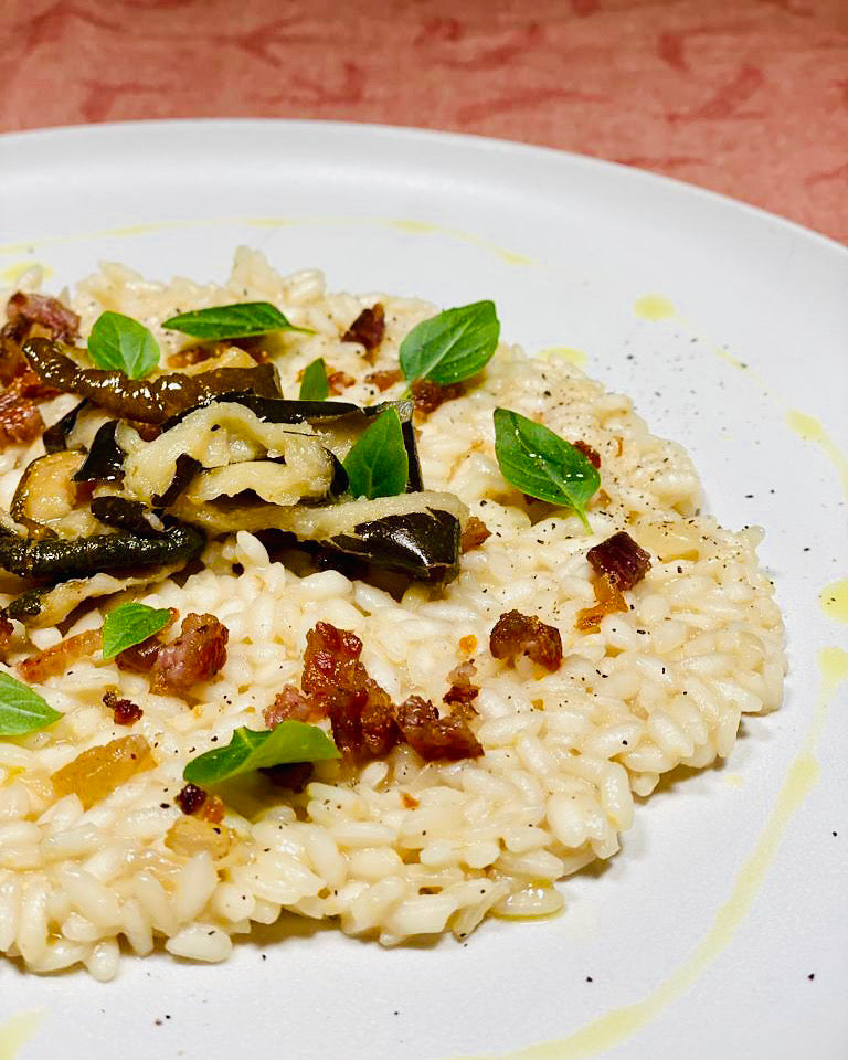 RISOTTO WITH ZUCCHINI, GUANCIALE CRUMBLE AND FRESH BABY BASIL