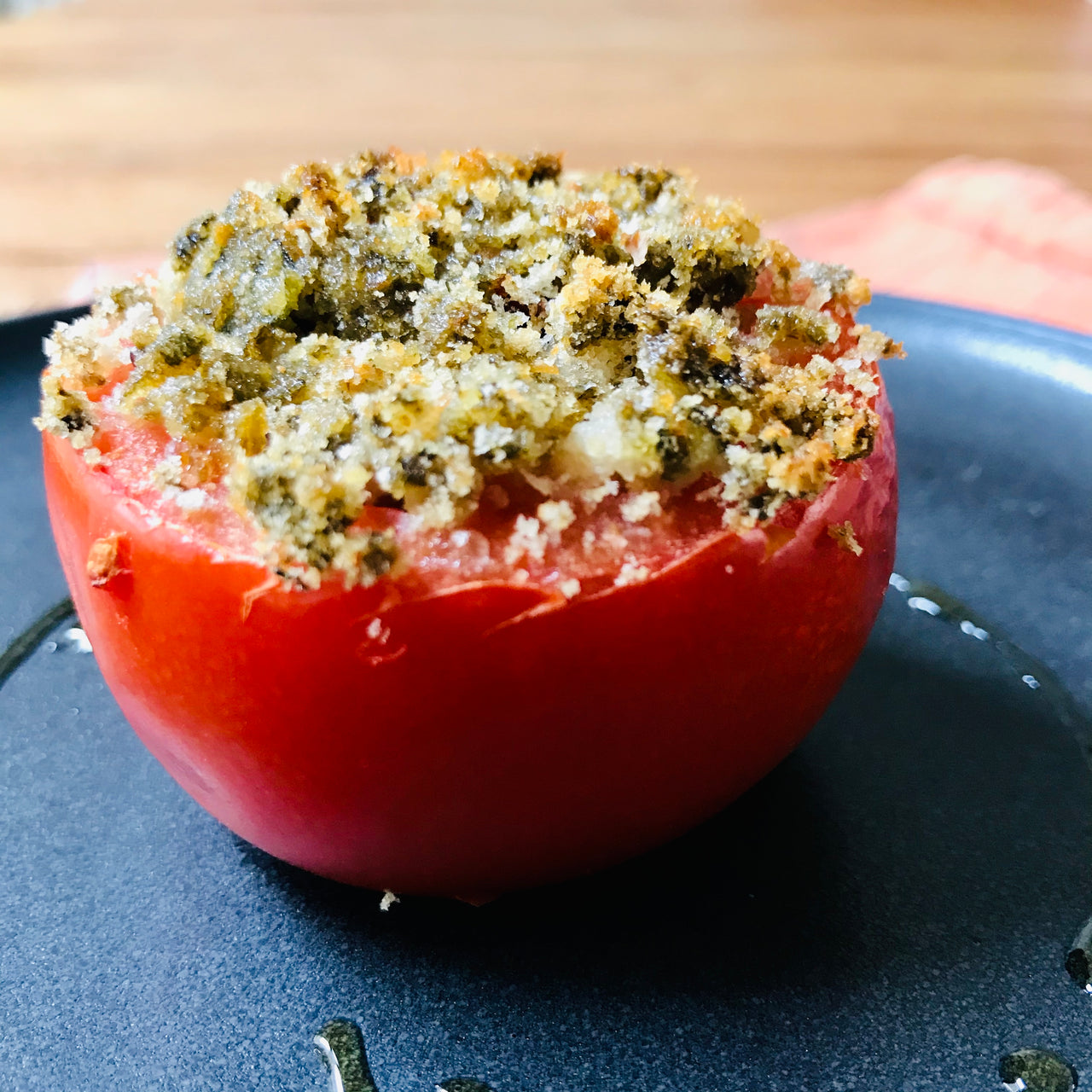 OVEN BAKED TOMATO FILLED WITH ERMES RICE AND CAPERS CRUMBLE