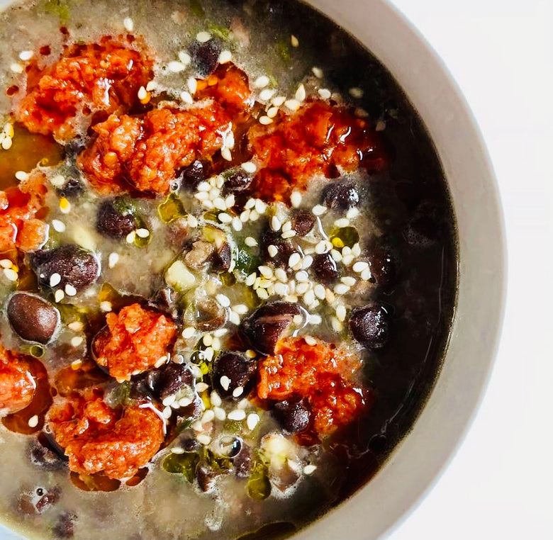 BLACK CHICKPEAS AND ENDIVE SOUP WITH ROASTED CHERRY TOMATOES SPREAD